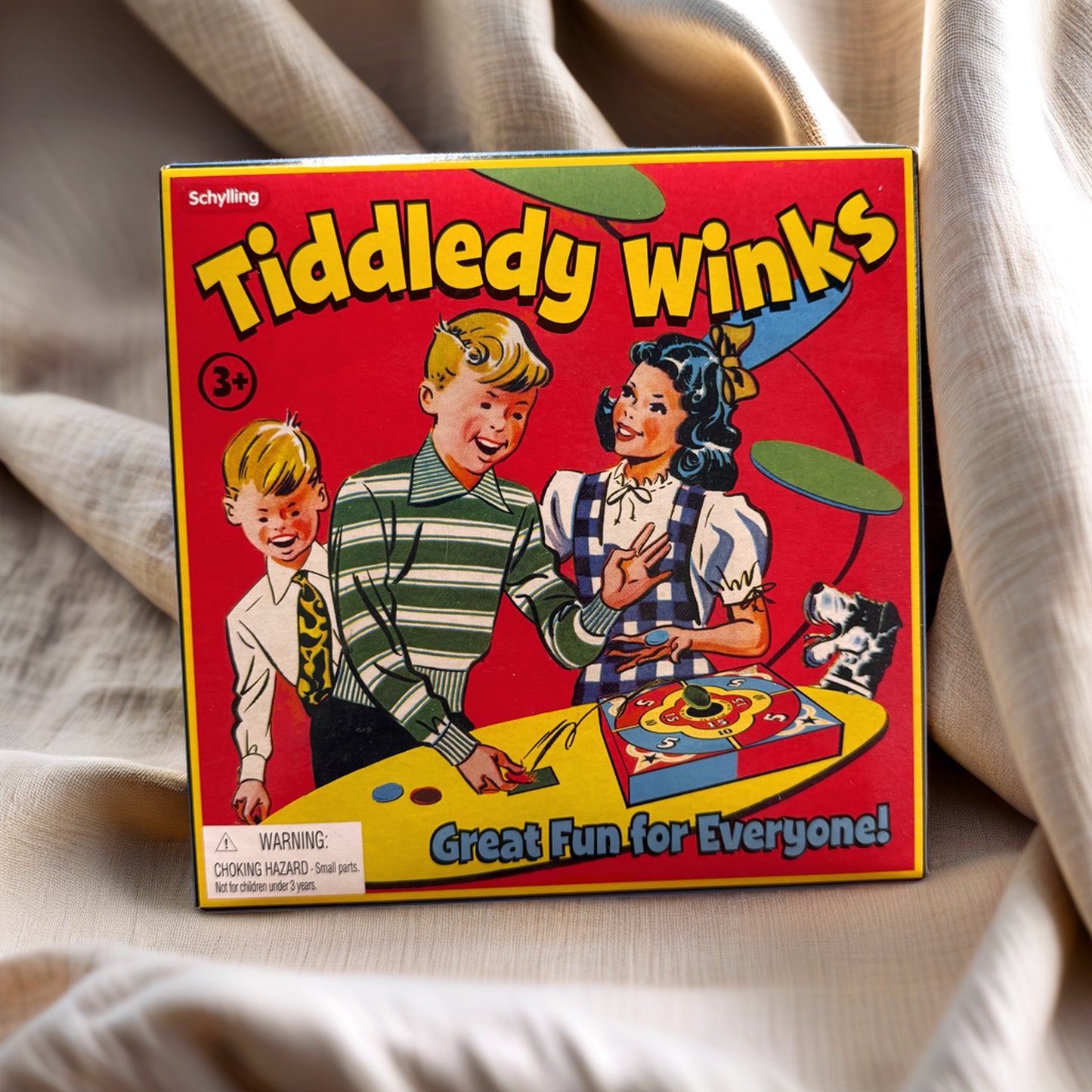 Photo of Tiddledy Winks on fabric background